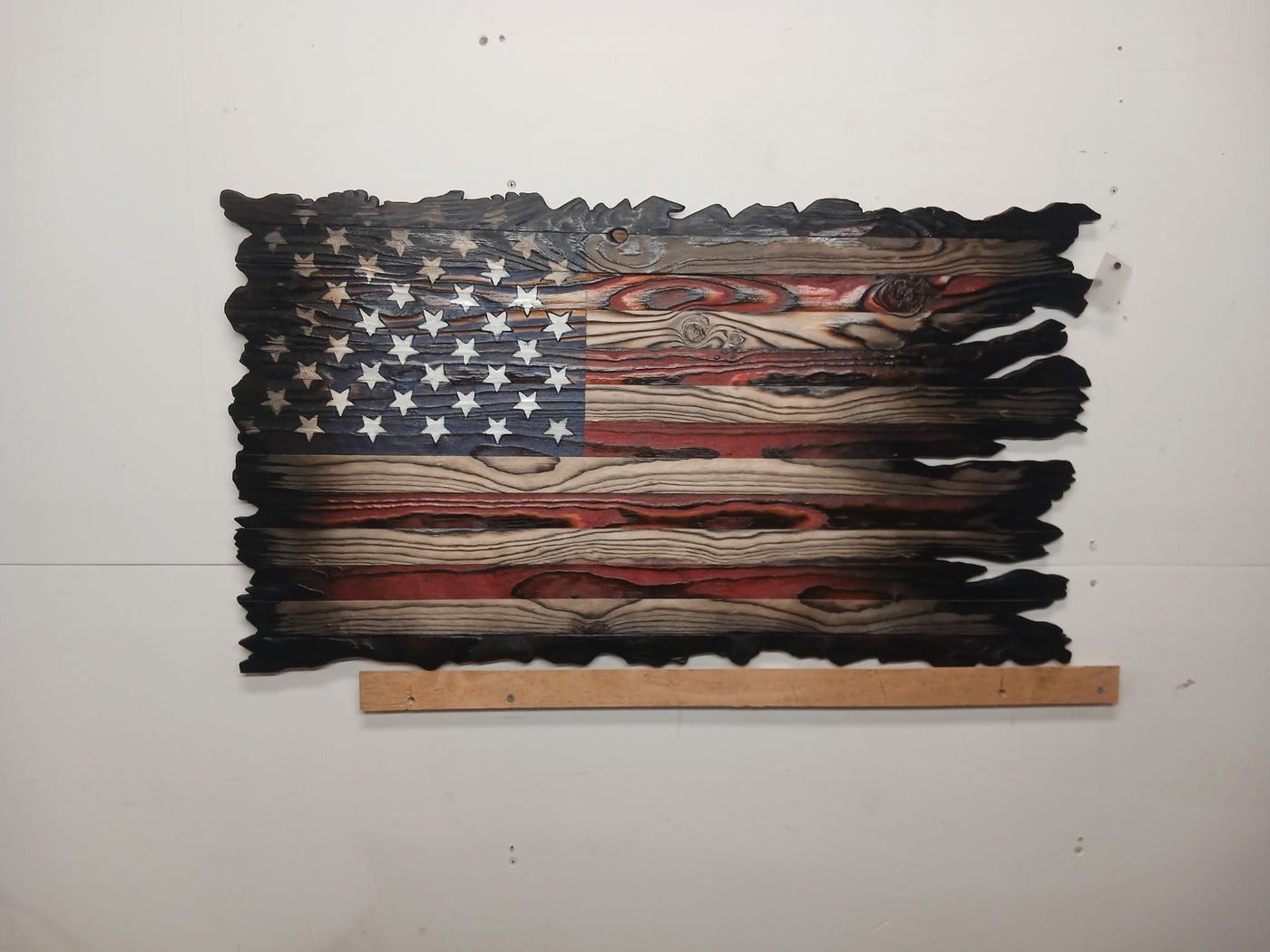 Patriotic, tattered, rustic wooden flag