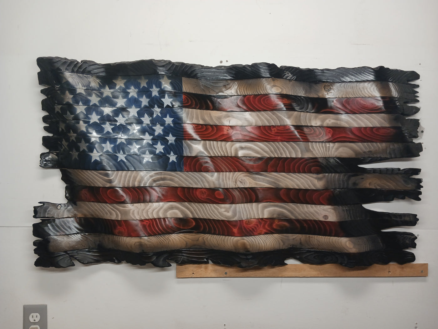 Patriotic, tattered, wavey, rustic wooden flag