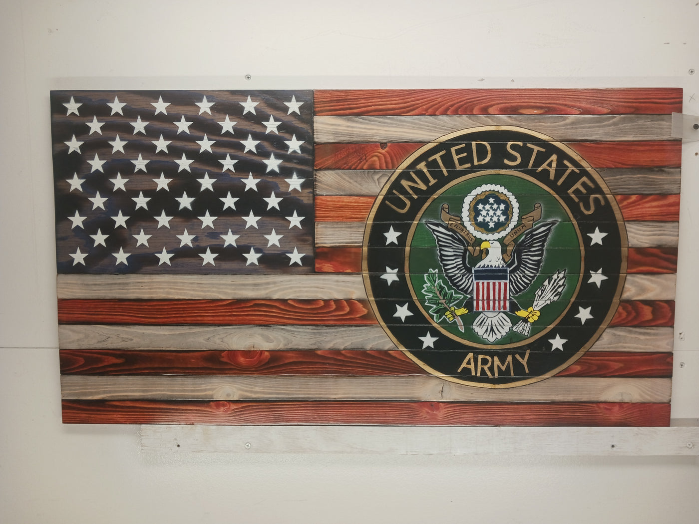 Wooden flag with the United States Army emblem, handcrafted to represent honor and commitment to the nation